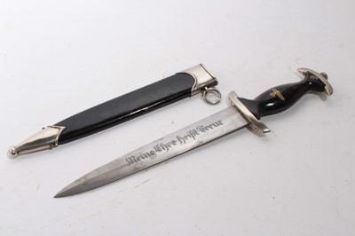 Lot 968 - Composite Nazi SS model 1933 dagger, later painted wooden grip and insignia, the blade etched 'Meine Ehre heist True', in black painted scabbard with nickel mounts.