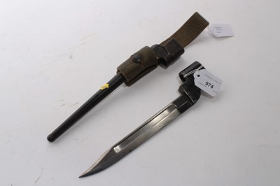 Lot 974 - Second World War British No.4 MK II Spike Bayonet in scabbard with webbing sheath, together with a knife bayonet (2)