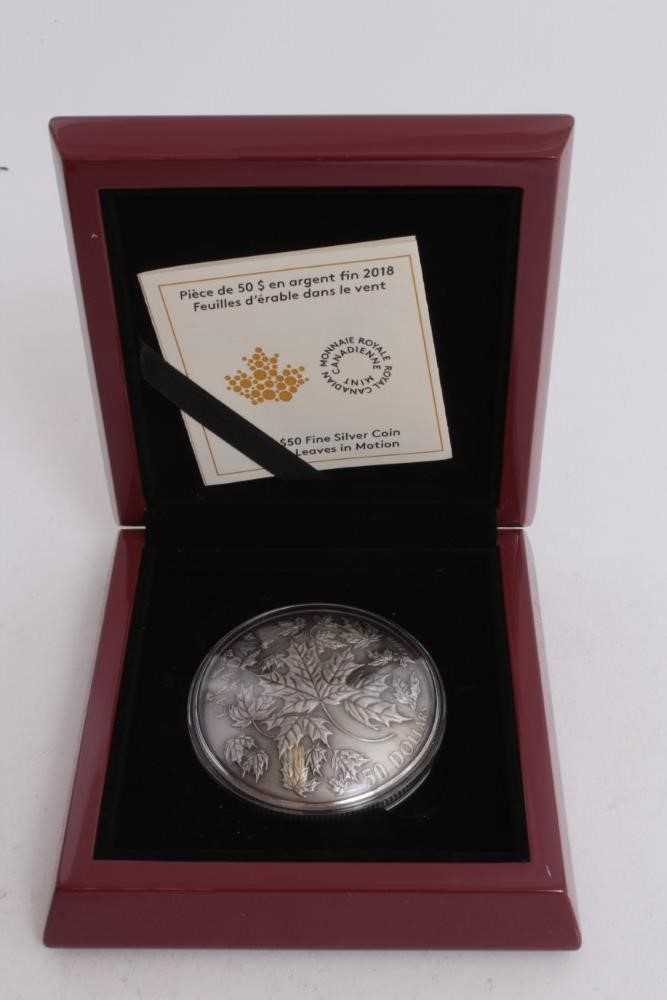 Lot 502 - Canada - The Royal Canadian Mint fine silver fifty dollar 5oz 'Maple Leaves in Motion coin 2018 (N.B. domed shape cased with certificate of authentication) (1 coin)