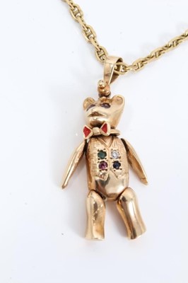 Lot 281 - 9ct gold gem set jointed teddy bear pendant on 9ct gold chain