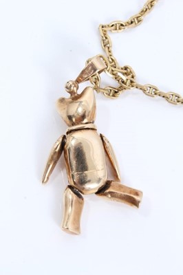 Lot 281 - 9ct gold gem set jointed teddy bear pendant on 9ct gold chain