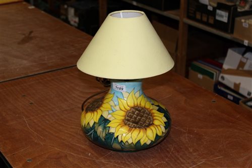 Lot 1189 - Moorcroft pottery lamp with sunflower...