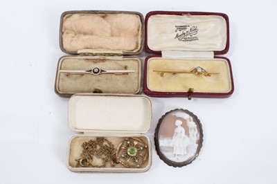 Lot 296 - Edwardian diamond bar brooch, Edwardian opal bar brooch, Edwardian peridot and seed pearl pendant and a cameo brooch (4)