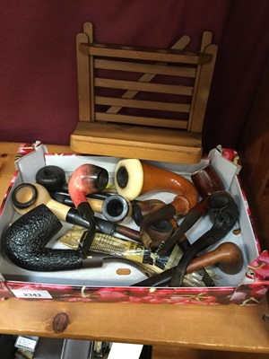 Lot 2343 - Collection of old smoking pipes, including Calabash, Briar, Meerschaum and others, some unused, together with an old pipe rack (12)