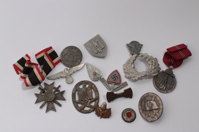 Lot 764 - Collection of Second World War Nazi badges and insignia to include RAD badge, War badge, Eastern front medal and others (qty)