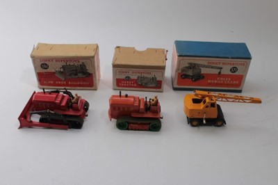 Lot 1670 - Dinky Supertoy Blaw Knox Bulldozer No561, Heavy Tractor No563 and a Coles Mobile Crane No571 all boxed