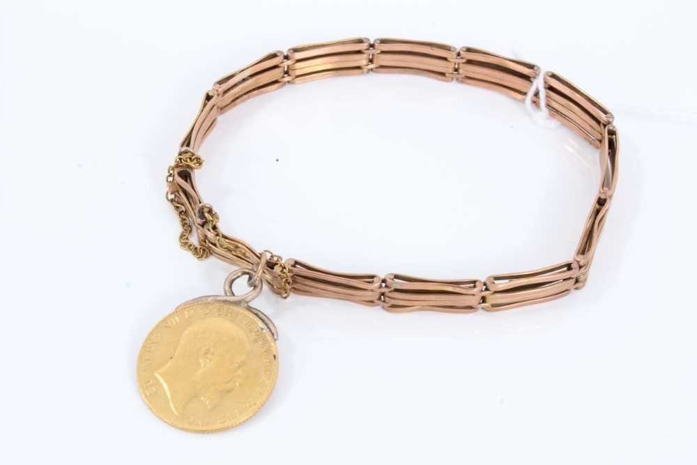 Lot 301 - Edwardian 9ct rose gold bracelet with Edwardian gold half Sovereign fob, 1910