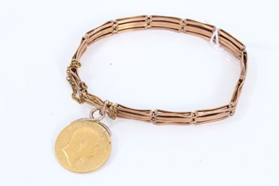 Lot 301 - Edwardian 9ct rose gold bracelet with Edwardian gold half Sovereign fob, 1910