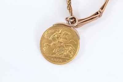 Lot 301 - Edwardian 9ct rose gold bracelet with Edwardian gold half Sovereign fob, 1910