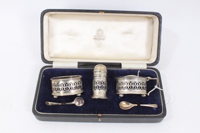 Lot 310 - 1920s silver three piece cruet set in fitted case