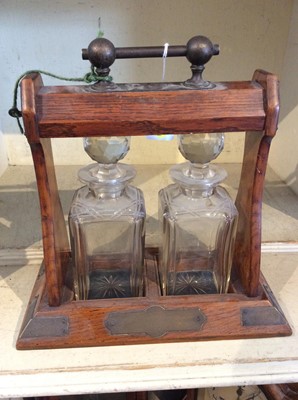 Lot 2417 - Edwardian oak two bottle tantalus