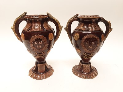 Lot 89 - Pair of Castle Hedingham Edward Bingham brown glazed twin handled pottery vases, 28cm high