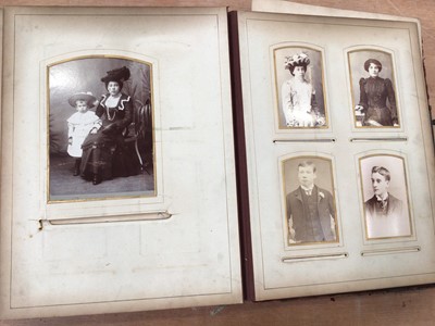 Lot 1421 - Postcards in album including real photographic social history