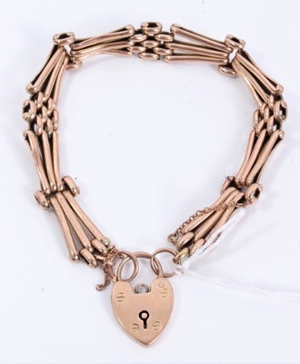 Lot 315 - 9ct rose gold bracelet with padlock clasp