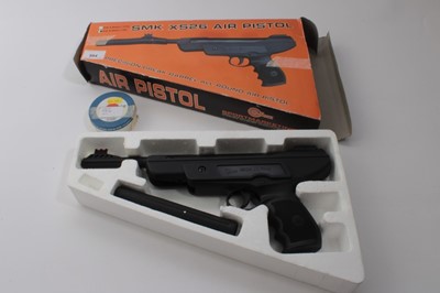 Lot 984 - SMK XS26 .22 Calibre Air Pistol in original box, together with a tin of pellets.