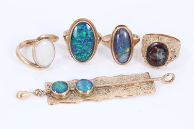 Lot 333 - Four 9ct gold opal rings and 9ct gold opal pendant