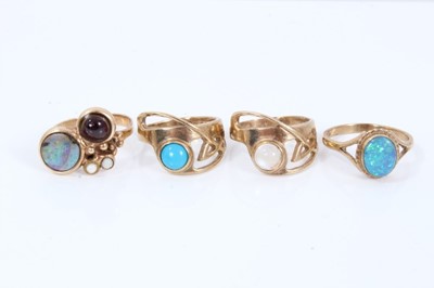 Lot 338 - Four 9ct gold rings set with semi precious stones