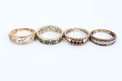 Lot 340 - Four 9ct gold band rings