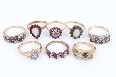 Lot 343 - Eight 9ct gold multi gem set cluster rings