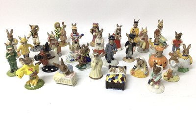 Lot 1156 - Twenty-nine Royal Doulton Bunnykins figures - Rainy Day, New Baby, Angel, Schoolmaster, Sailor, Gardener, Easter Parade, Judge, Easter Greetings, Bathtime, Businessman, Billie & Buntie, Stop Watch,...