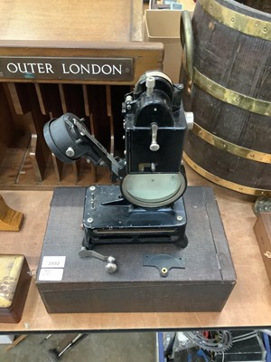 Lot 2452 - Pathé Baby Projector with quantity of film reels, dated 1920s
