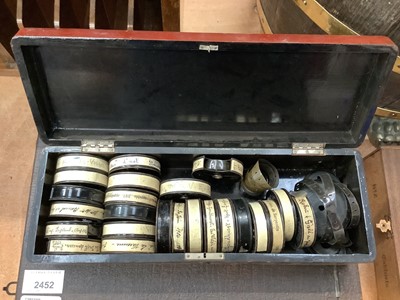 Lot 2452 - Pathé Baby Projector with quantity of film reels, dated 1920s