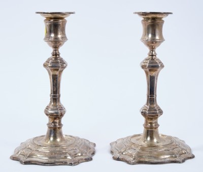 Lot 410 - Pair of large Edwardian silver candlesticks in the George II style (Sheffield 1906)