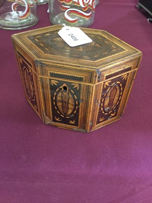 Lot 2406 - Georgian inlaid tea caddy, of hexagonal form, together with a Victorian tortoiseshell and inlaid mother of pearl card case, and a carved horn bird (3)