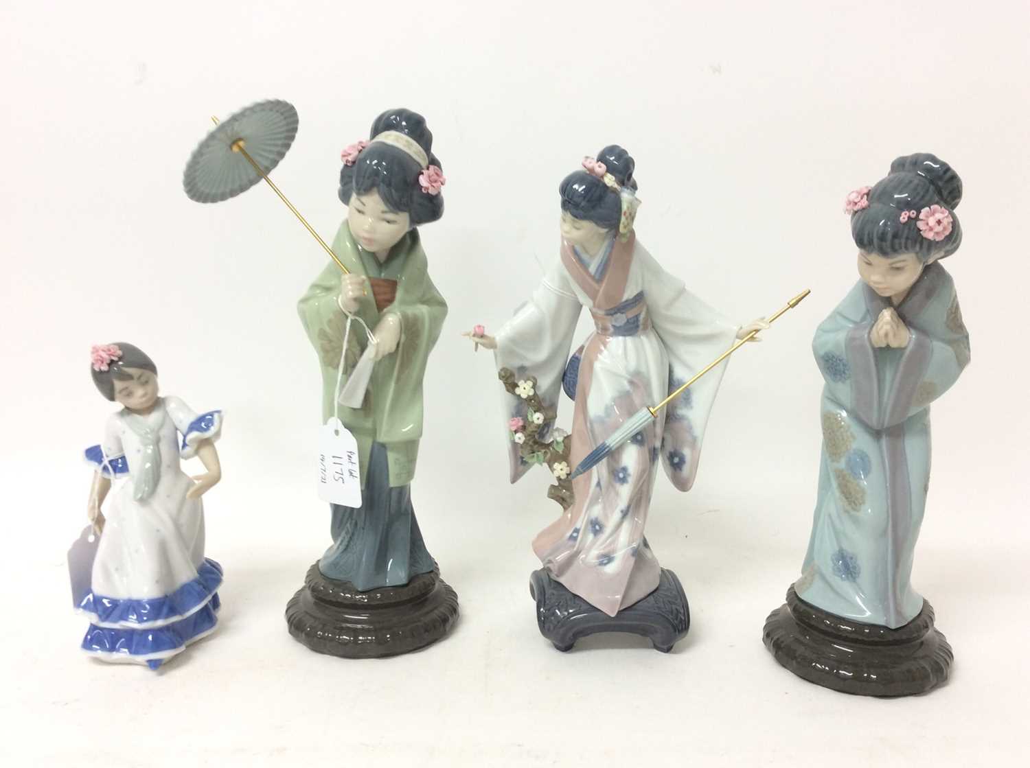 Lot 1175 - Four Lladro porcelain figures - Geisha girls