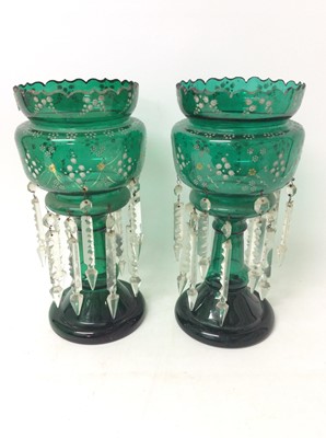 Lot 1190 - Pair of Victorian green glass lustres, with gilt and enamel decoration, and prismatic drops, 35cm high