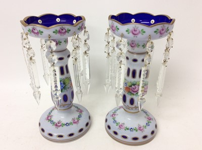 Lot 1191 - Pair of Bohemian flash cut and enamelled blue glass lustres with prismatic drops, 26.5cm high