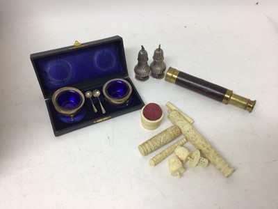 Lot 2422 - Pair of silver salt cellars with blue glass liners in a fitted case (Birmingham 1918), together with a pair of Continental silver pepperettes, three draw spotting scope and a group