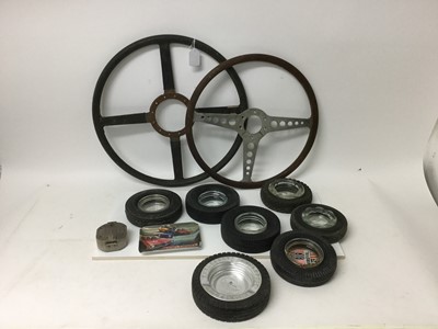 Lot 1897 - Group of seven Vintage advertising ashtrays in the form car tyres (various manufactures) together with two vintage steering wheels