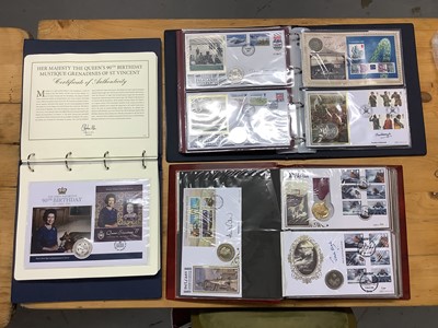 Lot 578 - World - Mixed stamp coin medal covers in two boxes to include twelve collector cover albums (qty)