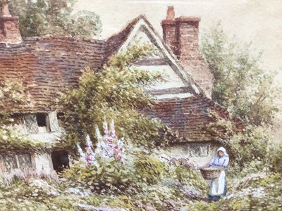 Lot 143 - W Carter, pair watercolours, A cottage garden with a woman holding a basket, signed lower left, and a cottage and garden, signed lower left