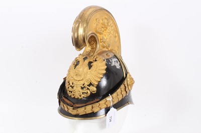 Lot 734 - Imperial Austrian 1905 Pattern Dragoon Officers helmet with gilt double headed eagle badge, lion and serpent cresting with lions head bosses and acanthus leaf chin scales, original silk and leather...