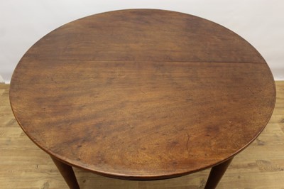 Lot 914 - Good quality early 20th century mahogany dining table and two leaves on massive bulbous legs.