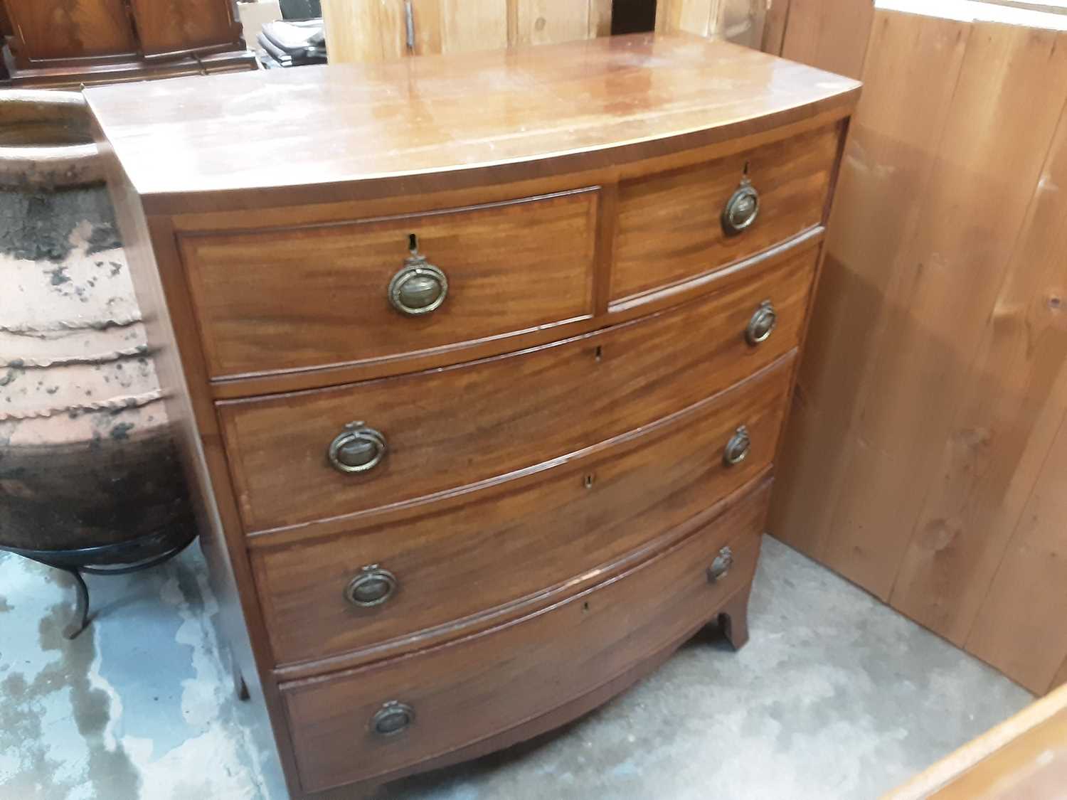 Lot 907 - Regency bowfront mahogany chest