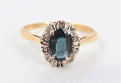 Lot 541 - Sapphire and diamond cluster ring