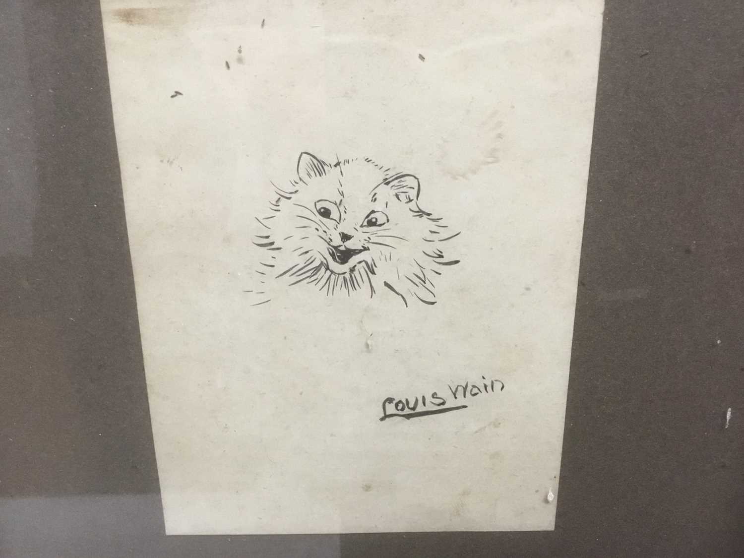 Lot 166 - Louis Wain (1860-1939) pen and ink drawing - a smiling cat, signed, 10.5cm x 8.5cm, in glazed frame  
Provenance: Bonhams 28th February 2007, lot 363