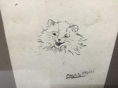 Lot 166 - Louis Wain (1860-1939) pen and ink drawing - a smiling cat, signed, 10.5cm x 8.5cm, in glazed frame  
Provenance: Bonhams 28th February 2007, lot 363