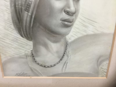 Lot 173 - 1950s ink and watercolour on ivorine panel - portrait of a young African lady, signed and dated '53, 17.5cm x 13cm, in glazed frame