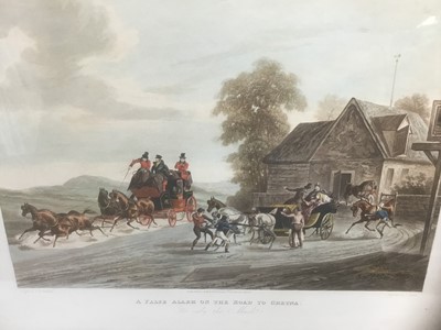 Lot 291 - Pair of 19th century hand coloured aquatints by R. Reeves after C. Newhouse, coaching scenes entitled - 'A False Alarm On The Road To Gretna' and 'One Mile From Gretna', published by Moss, 37cm x 4...
