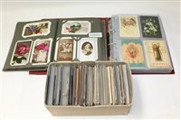 Lot 1372 - Postcards - in four albums, plus loose in...