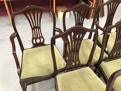 Lot 858 - Set of six George III style mahogany dining chairs, each with arched pierced back and slip in seat, to include a pair of carvers