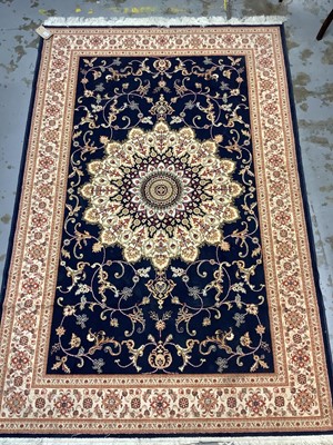 Lot 1556 - Persian design rug