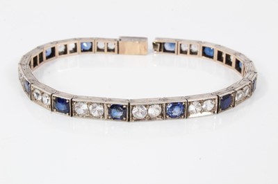 Lot 545 - Art Deco synthetic blue sapphire and white sapphire line bracelet