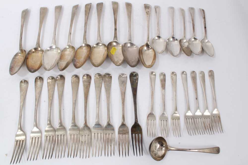Lot 201 - Composite set of early 19th century Old English pattern flatware, with armorial crest. 32 pieces.