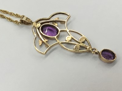 Lot 687 - Edwardian style 9ct gold amethyst and seed pearl pendant on chain