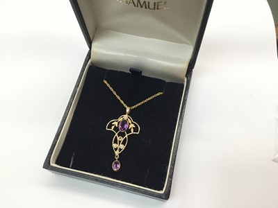 Lot 687 - Edwardian style 9ct gold amethyst and seed pearl pendant on chain